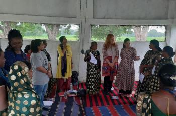 Members of the Fish Producing Group interacting with the MSC and WorldFish team on using a training tool from the GALS toolkit